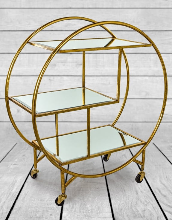 Antiqued Gold/Bronze Round Metal Bar Trolley With Mirror Shelves in situ