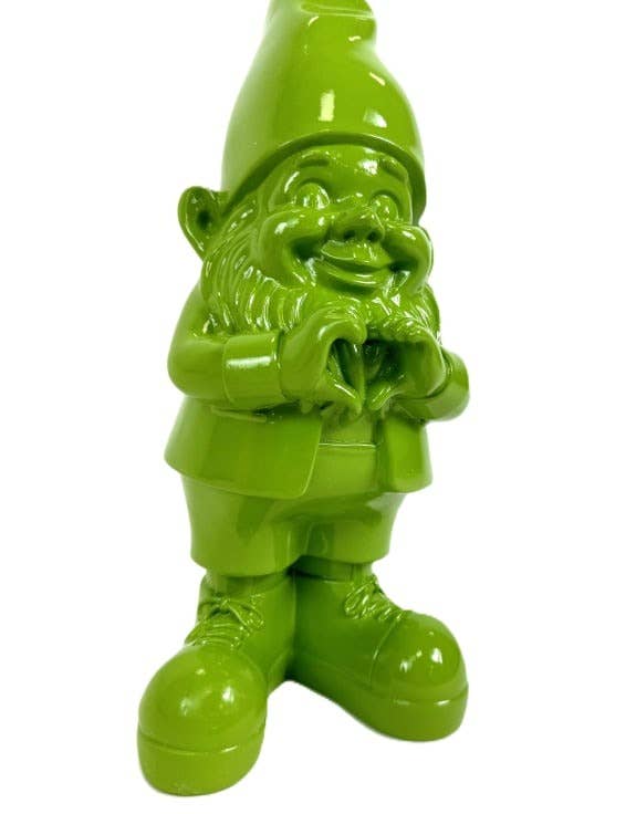 Green garden gnome figurine on a white background