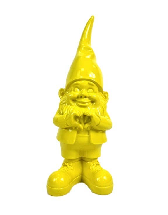 Yellow garden gnome figurine on a white background