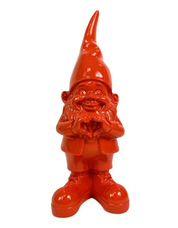 Red garden gnome figurine on a white background